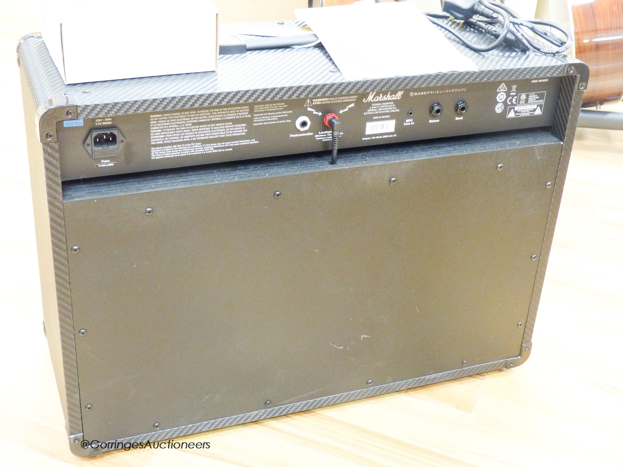 A Marshall MG 102 CF guitar amp with footswitch